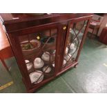 MAHOGANY CHINA DISPLAY CABINET WITH TWO GLAZED DOORS AND TWO INTERNAL SHELVES.