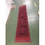 RED GROUND WOVEN MESHWANI RUNNER, FOUR MEDALLIONS, 254 CM X 60 CM