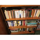FOUR SHELVES OF FICTION AND REFERENCE BOOKS, INCLUDING RUDYARD KIPLING PUBLISHED BY MACMILLAN & CO