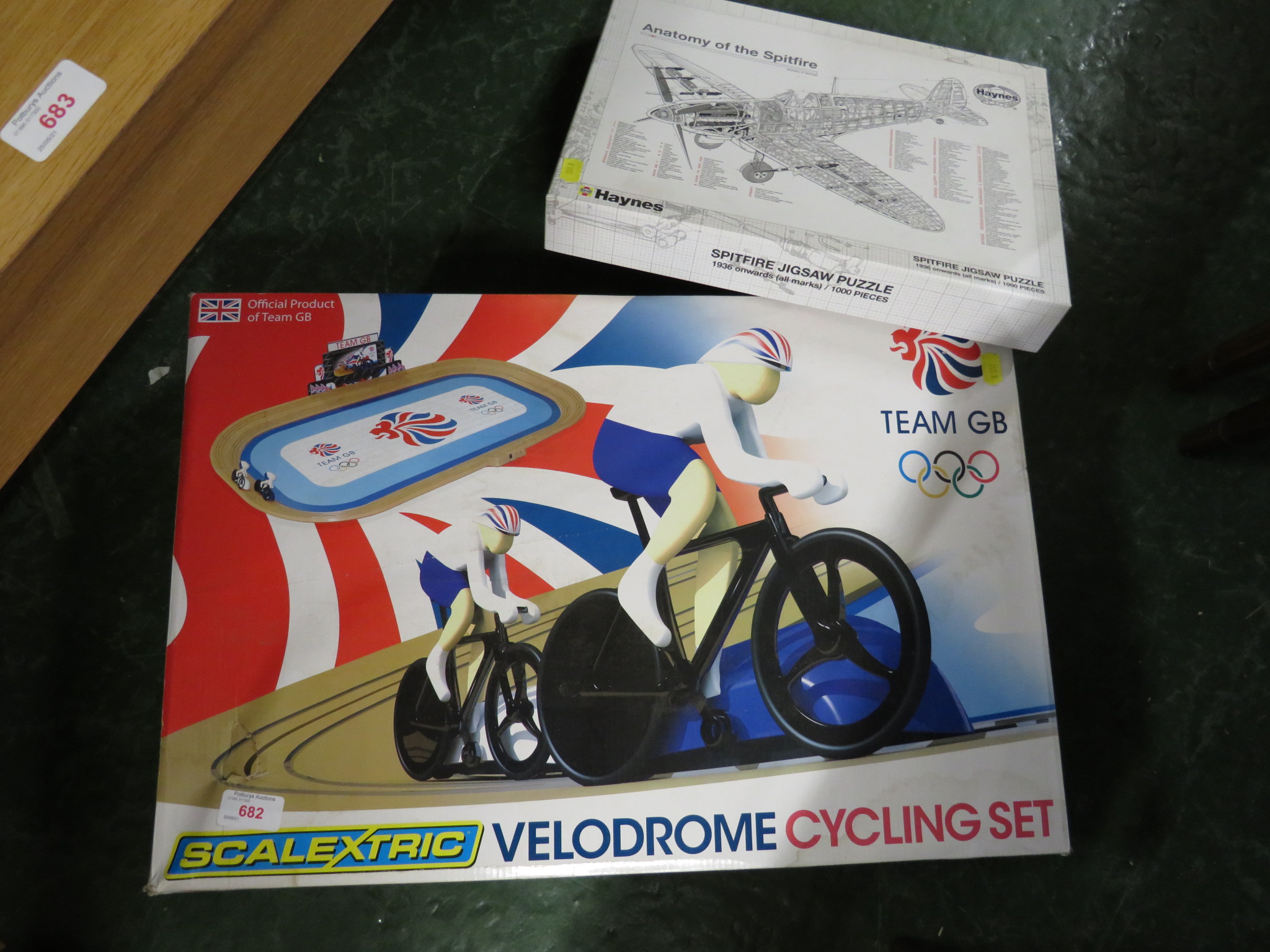 BOXED SCALEXTRIC VELODROME CYCLE SET, TOGETHER WITH A BOXED SPITFIRE JIGSAW PUZZLE.