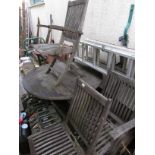 CIRCULAR WOODEN FOLDING GARDEN TABLE AND THREE CHAIRS