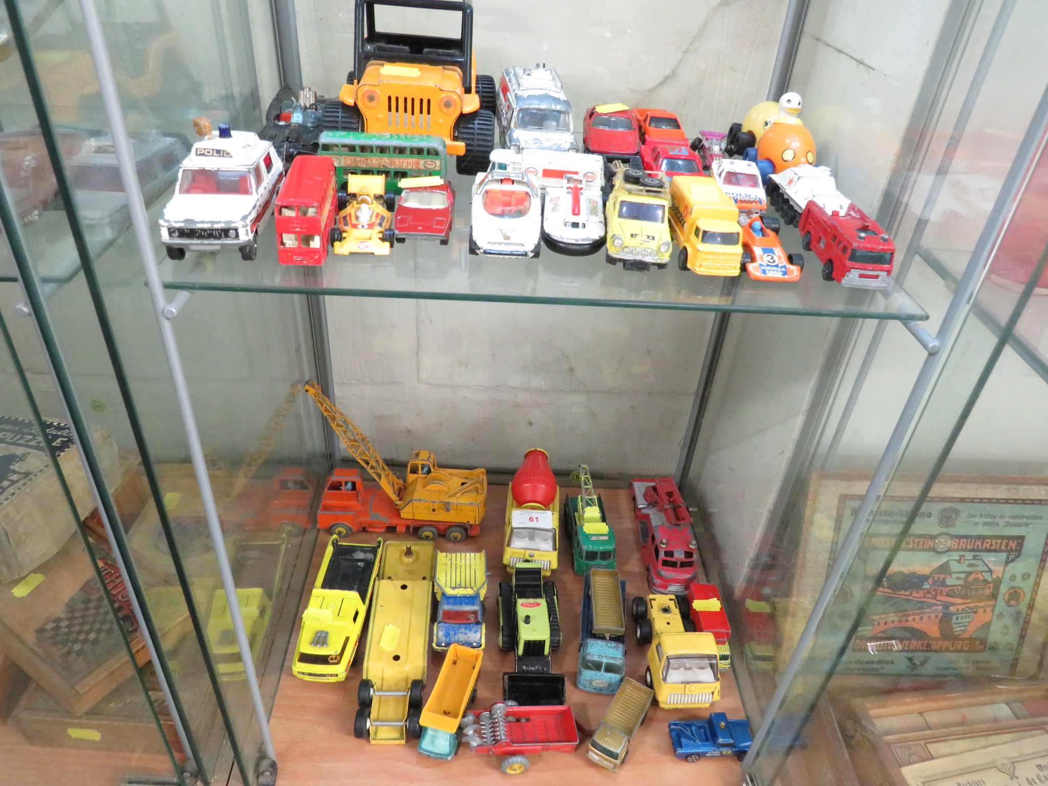 TWO SHELVES OF VINTAGE DIE CAST VEHICLES, DINKY TOYS, MATCH BOX ETC.