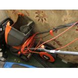 FLYMO ELECTRIC LAWN MOWER TOGETHER WITH EXTENSION REEL .