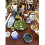 POTTERY ITEMS INCLUDING JUGS, BOWLS , MUGS AND DISHES.