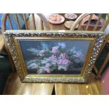 PRINT ON BOARD OF FLOWERS IN A GILT EFFECT FRAME.