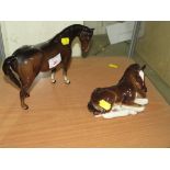BESWICK FIGURE OF A HORSE TOGETHER WITH A RUSSIAN FIGURE OF A FOAL.