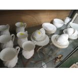 SELECTION OF WHITE CHINA TEA WARE.