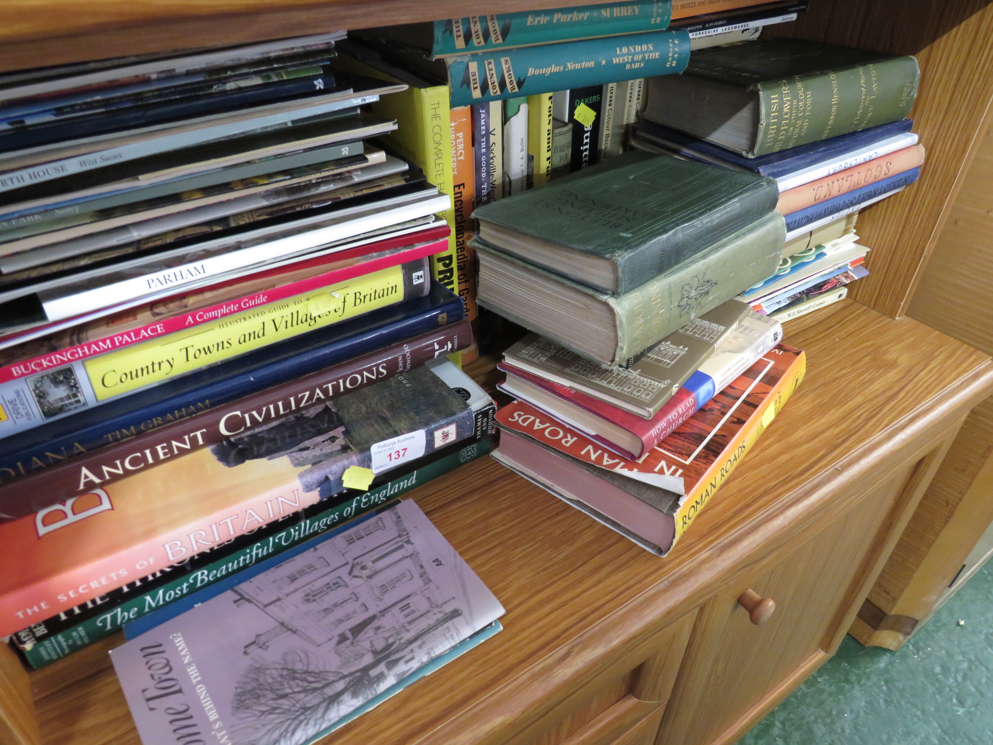 ONE SHELF OF BOOKS.