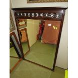 RECTANGULAR BEVEL EDGE OVER MANTEL MIRROR IN A MAHOGANY FRAME WITH FRET TOP