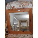 SQUARE MIRROR IN A PINE FRAME.