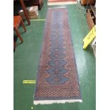 BLUE GROUND PATTERN RUNNER WITH FIFTEEN MEDALLIONS