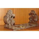 BLACK FOREST STYLE CARVED WOODEN EXTENDING BOOK STAND DEPICTING OWLS.