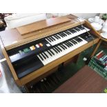 HAMMOND ELECTRIC ORGAN WITH WOOD EFFECT LIFT TOP STOOL.