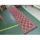 'OLD SUZNI' KILIM RED GROUND FLOOR RUNNER 237 BY 69 CM .