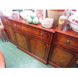 MAHOGANY VENEER SIDEBOARD, THREE DRAWERS OVER FOUR CUPBOARD DOORS.