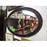 OVAL BEVEL EDGE WALL MIRROR IN FRAME.