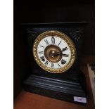 BLACK SLATE MANTEL CLOCK WITH AMERICAN MOVEMENT.