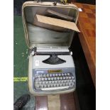 DIPLOMAT SUPER PORTABLE TYPE WRITER IN CASE.