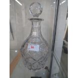 A LEAD CRYSTAL STOPPERED DECANTER