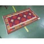 MAIMANA KILIM BROWN GROUND PATTERN RUG 136 BY 82 CM.