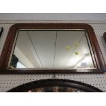 SMALL RECTANGULAR OVERMANTEL MIRROR WITH AN INLAID WOODEN FRAME.