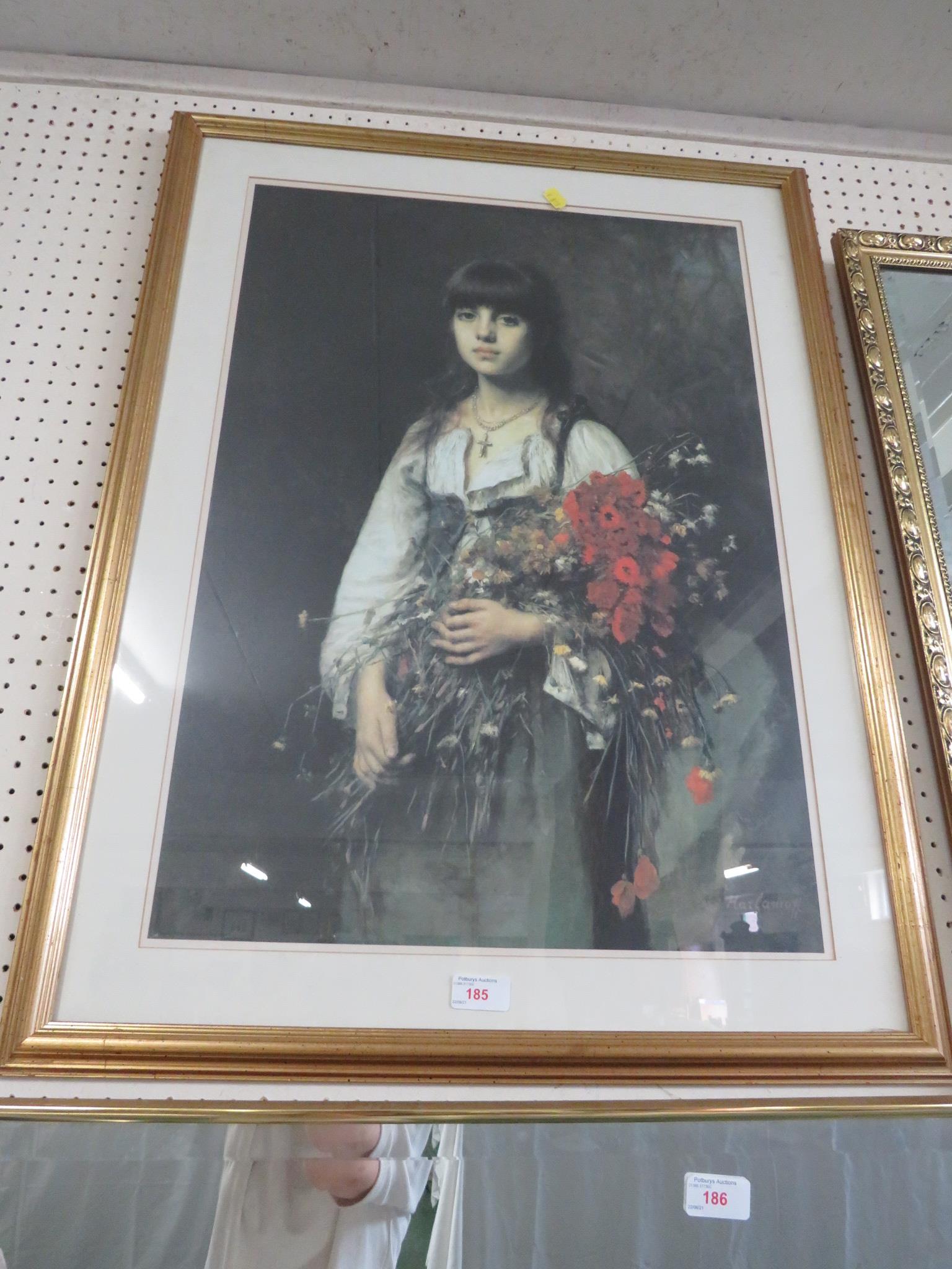 LARGE FRAMED AND GLAZED PRINT OF GIRL WITH FLOWERS.