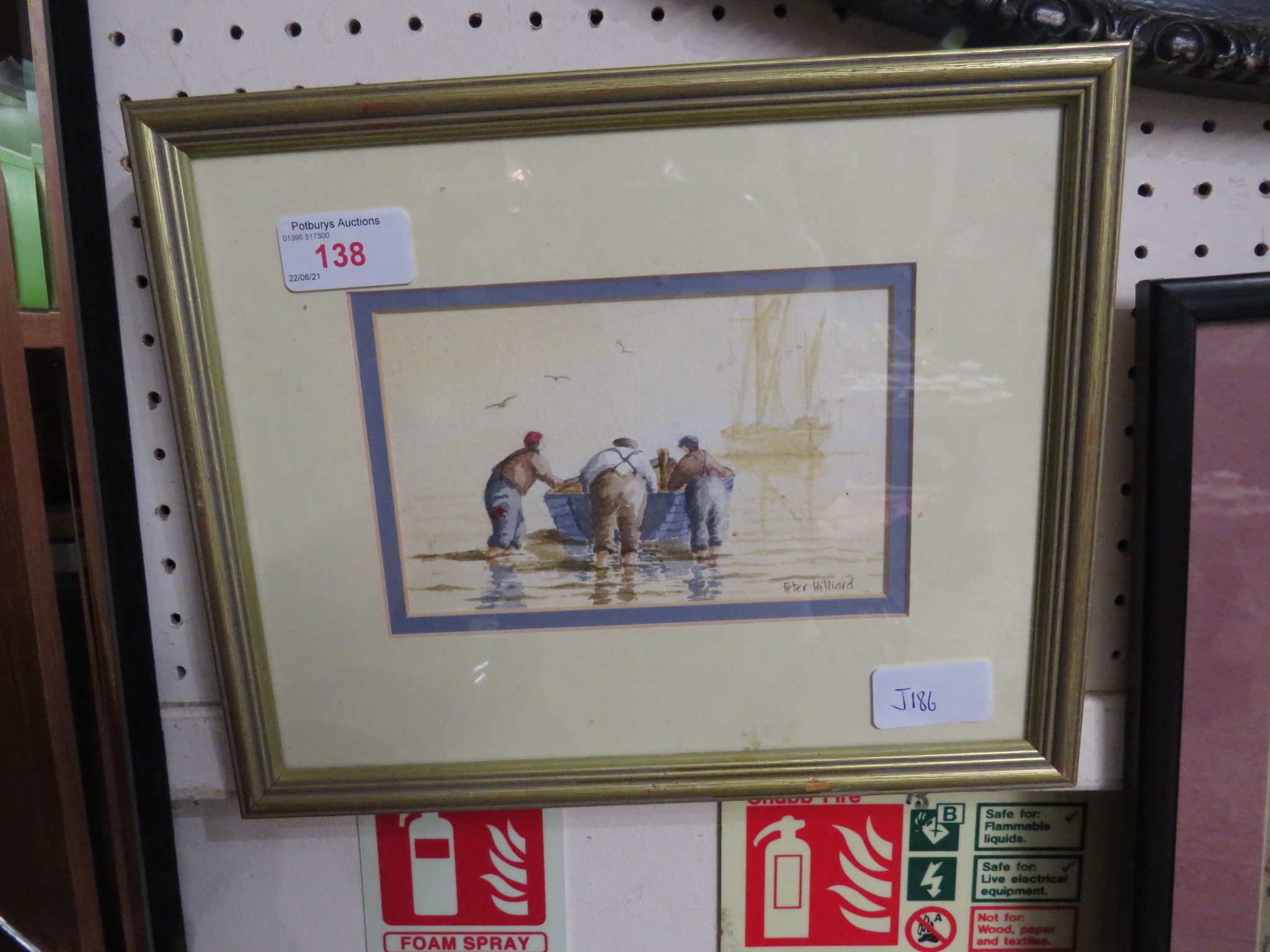 SMALL FRAMED AND GLAZED WATER COLOUR OF FISHERMAN SIGNED PETER HILLIARD.