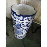 BLUE AND WHITE CERAMIC UMBRELLA STICK STAND.