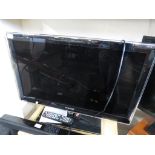 SAMSUNG 32 INCH LED TV WITH REMOTE AND MANUAL.