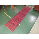 RED GROUND MESHWANI FLOOR RUNNER 233 BY 54 CM.