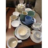 TWO TEA POTS , MILK JUGS AND A ASSORTMENT OF DINING CHINA.