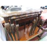 NEST OF THREE MAHOGANY VENEERED OCCASIONAL TABLES.