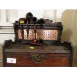OAK PIPE RACK WITH ENGRAVED COPPER PANEL AND SINGLE DRAWER, TOGETHER WITH A SELECTION OF PIPES.
