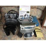 FOUR PORTABLE RADIOS, SONY WALKMAN, HEADPHONES, CASSETTES AND CLOCK RADIO.