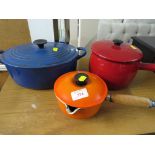 LE CREUSET CAST METAL CASSEROLE DISH AND SAUCE PAN , TOGETHER WITH A ENAMELLED SAUCE PAN AND LID.