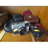 AN OLYMPUS 35 RC FILM CAMERA, CANON FILM CAMERA, PAIR OF CARL ZEISS BINOCULARS, TOGETHER WITH A