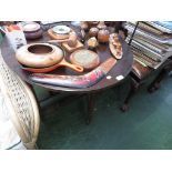 SMALL STAINED OAK OVAL GATE LEGGED TABLE.