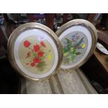 TWO FRAMED AND GLAZED OVAL PRINTS OF FLOWERS AFTER ELEANOR LUDGATE