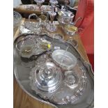 SILVER PLATED WARE INCLUDING TRAYS , THREE PART TEA SET , CANDLE HOLDER , MUFFIN DISH ETC.