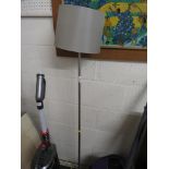 STAINLESS FLOOR STANDING LAMP WITH SHADE.