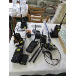 ANY TONE TWO WAY RADIO AND SIX OTHER TWO WAY RADIOS WITH SOME MANUALS AND ACCESSORIES. (TWO HAVE