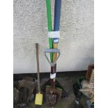 LONG HANDLED GARDENING HAND TOOLS - TWO SPADES, A RAKE AND A BROOM