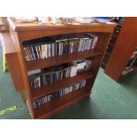 TEAK VENEERED OPEN BOOK CASE WITH TWO ADJUSTABLE SHELVES