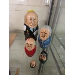 SET OF HUMOROUS NESTING DOLLS OF RUSSIAN LEADERS.