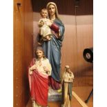 PAINTED PLASTER FIGURINE OF MARY AND BABY JESUS AND TWO OTHER RELIGIOUS ICONS FIGURES.