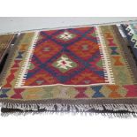 MAIMANA KILIM BROWN GROUND PATTERN RUG 136 BY 82 CM.