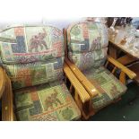 PAIR OF PINE FRAMED CONSERVATORY ARMCHAIRS WITH PATTERNED CUSHIONS (AF)