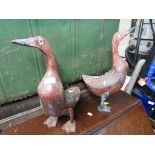 TWO WOODEN DUCK FIGURINES. (AF)