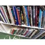 THREE SHELVES OF FICTION AND REFERENCE BOOKS INCLUDING AVIATION INTEREST.