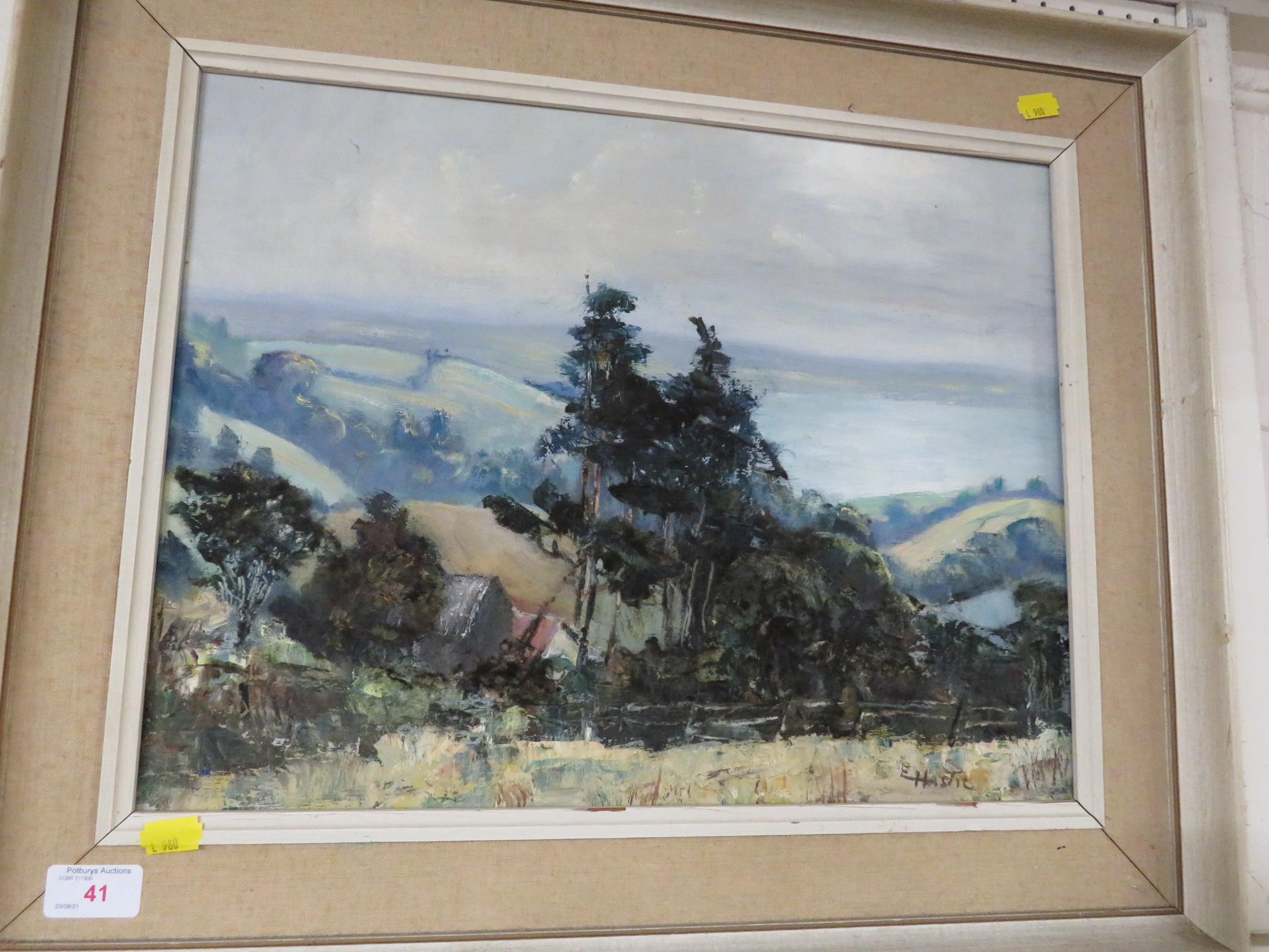 FRAMED OIL ON BOARD OF TREES IN LANDSCAPE SIGNED E. HASTIE LOWER RIGHT.